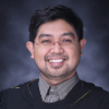 Clarence M. Batan